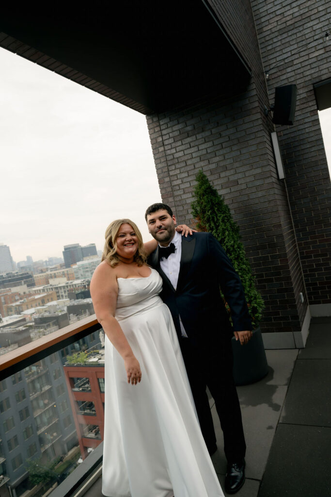 bride and groom wedding couples photos on chicago rooftop at hyatt hotel