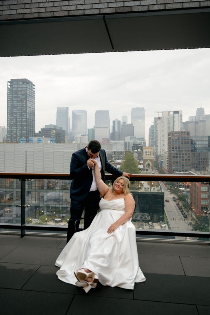 bride and groom wedding couples photos on chicago rooftop at hyatt hotel