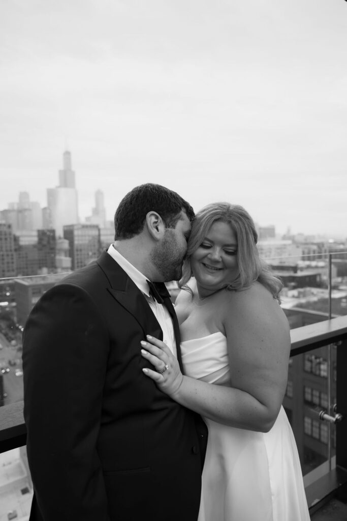 bride and groom wedding couples photos on chicago rooftop at hyatt hotel