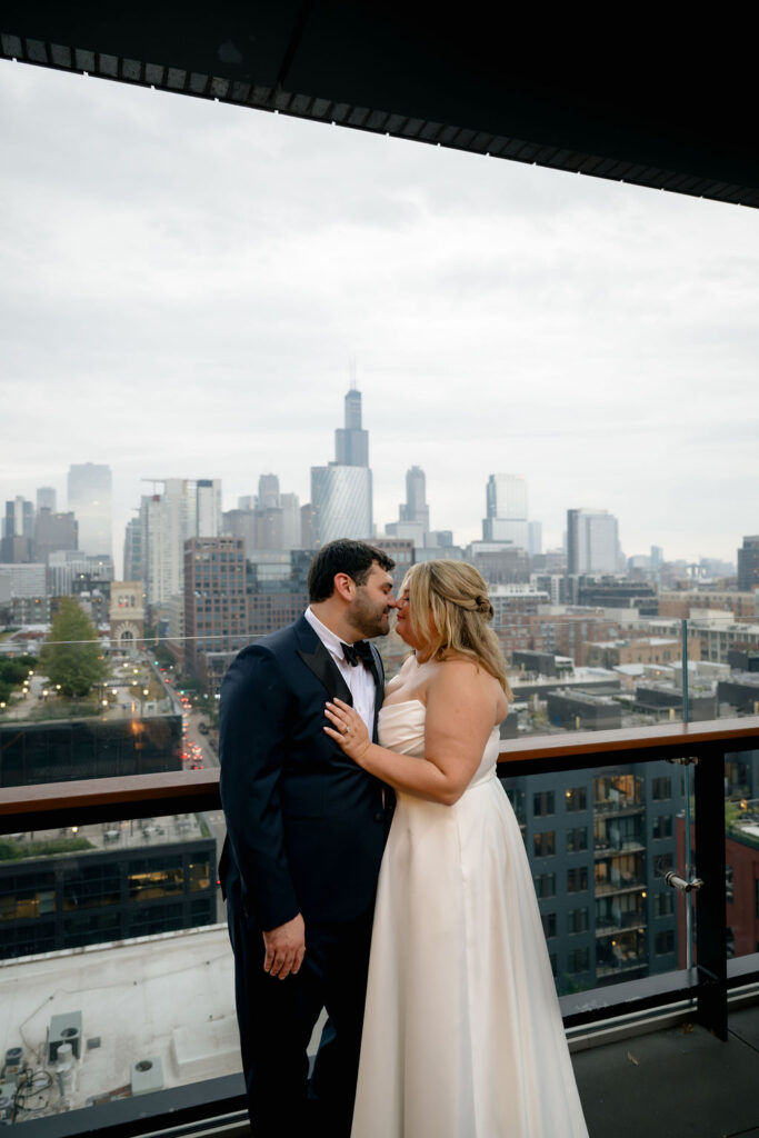bride and groom wedding couples photos on chicago rooftop at hyatt hotel