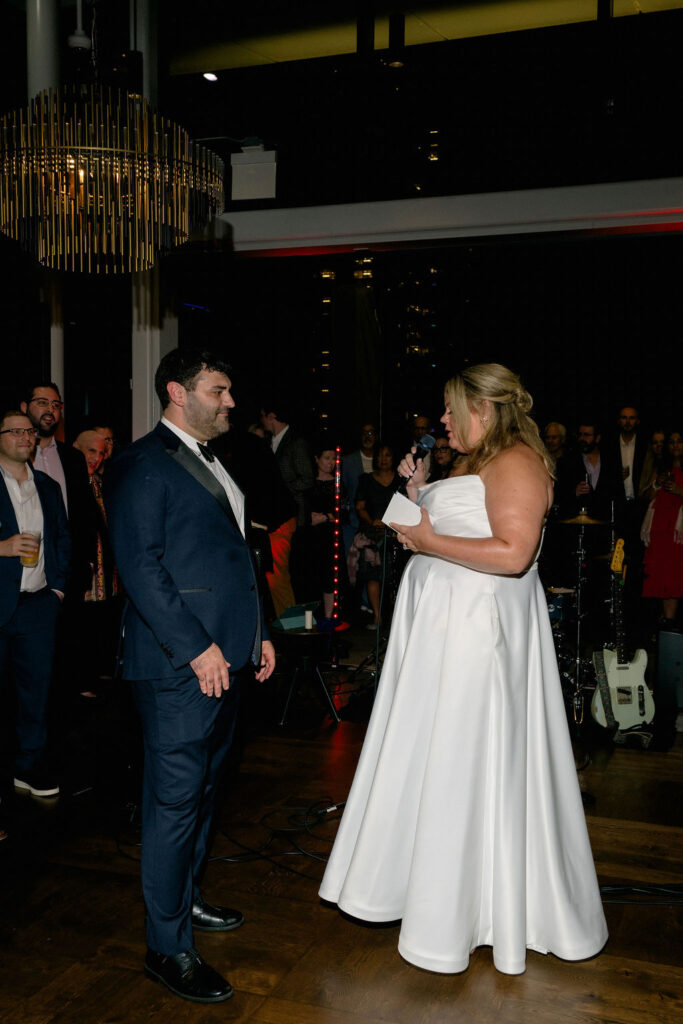 bride and groom wedding vows at reception in chicago at fiorettas in west loop
